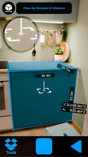 AR Meter measuring blue storage box in AR showing dimensions 36.4in x 33.0in with volume 39838.6in³ and area calculations on smartphone screen