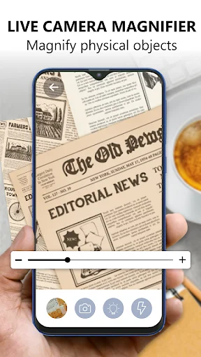 Live camera magnifier app displaying magnified newspaper text with zoom slider control and magnification tool buttons
