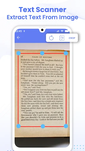 Text Scanner OCR extracting text from document with corner detection marks and crop tool for image-to-text conversion.