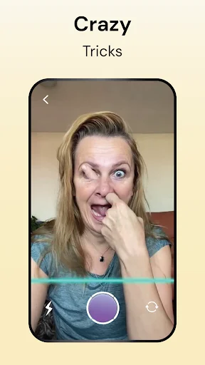 Crazy Tricks time warp scan filter creating hilarious facial effect with cyan scan line, purple capture button visible